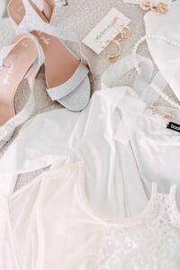 silver kitten heels styled with a midi dress for a wedding guest look
