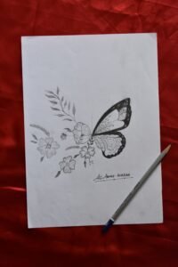flat lay of fine line floral and butterfly tattoo design sketches