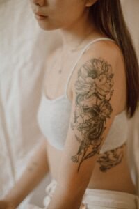 diagram showing side rib versus front rib versus under bust tattoo placement zones