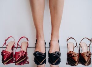 four kitten heel styles laid out, pump, slingback, mule, flip flop
