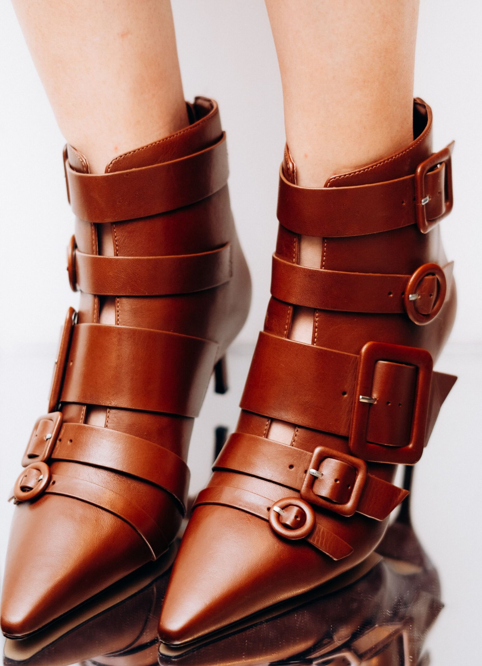 Brown Shoes to Wear With a Suit: The Complete Color Guide brown kitten heel ankle boots side by side