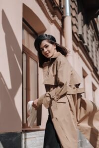 Beret Hat Women: The Ultimate 2026 Style Guide woman in a camel coat wearing a felted wool beret hat women style on a city sidewalk