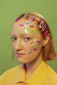 Hair Accessories for Girls: The Ultimate Guide for 2026 assortment of hair accessories for girls including headbands, snap clips, and mini claw clips on a pastel background